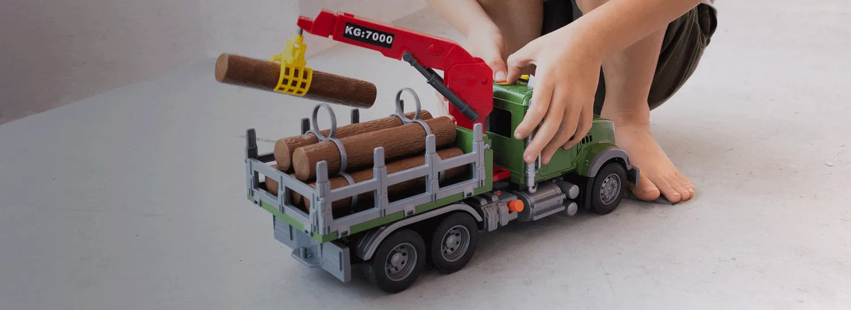Child building with the yellow-and-black take-apart construction set